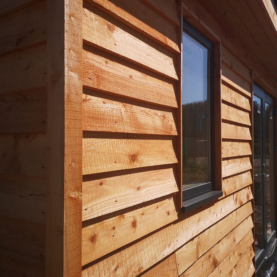 a feather edge clad cabin