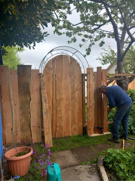 a wooden gate and fence