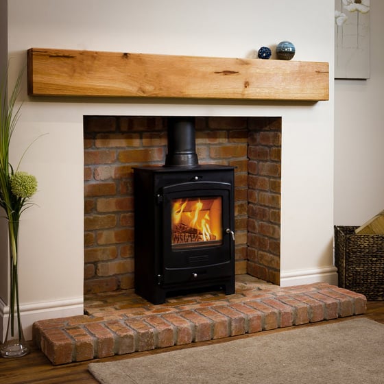 fireplace with oak mantle